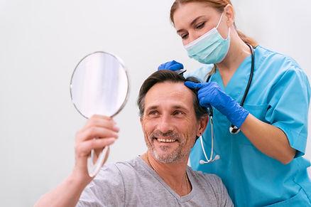 Patient happy with his hair transplant results