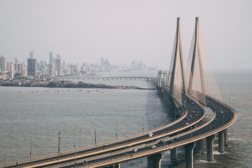 A high angle shot of Bandra Worli sealink in Mumbai enveloped with fog